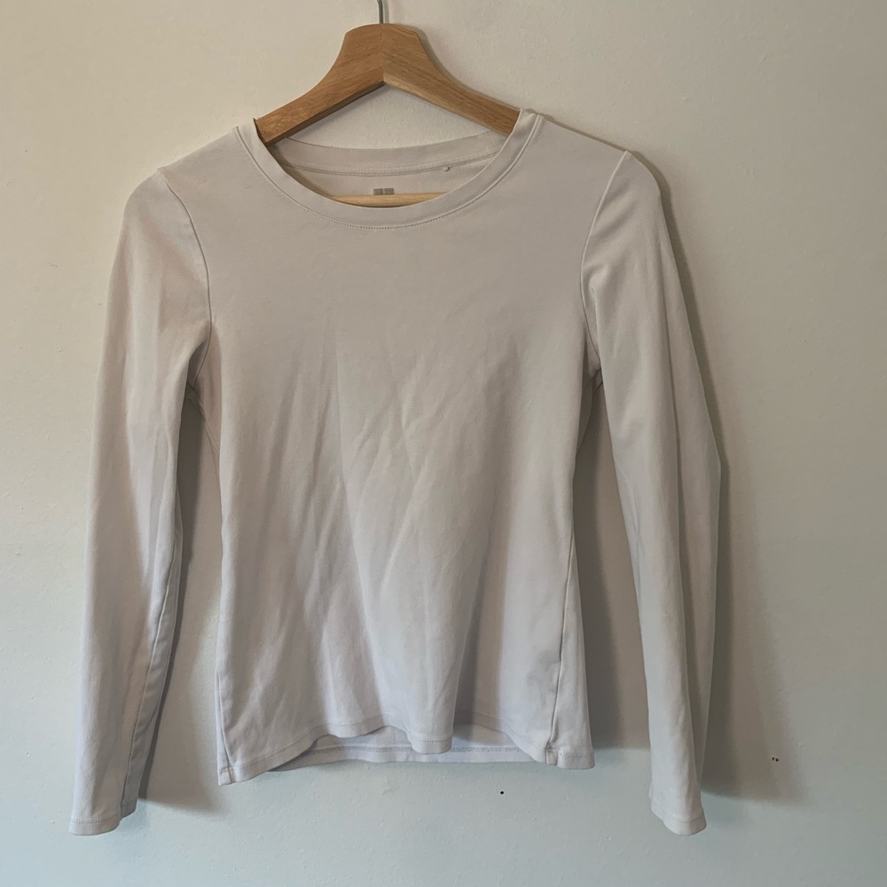 Uniqlo white tight fitting long sleeved shirt